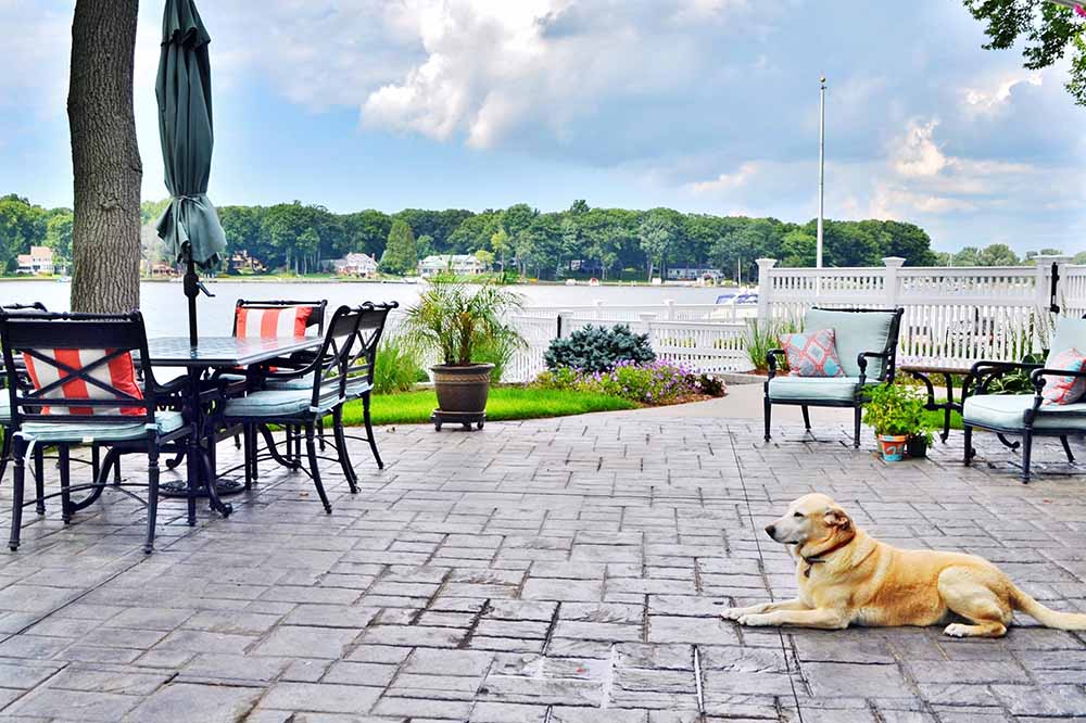 How Stamped Concrete Lowers Your Long-Term Landscape Maintenance Expenses